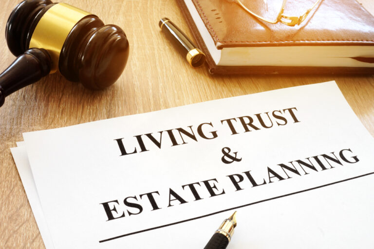 Documents that say, "Living Trust & Estate Planning".